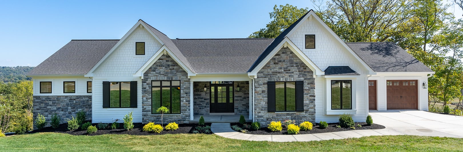 Front view of exterior of home at The Reserve at Rivers Pointe (cropped)